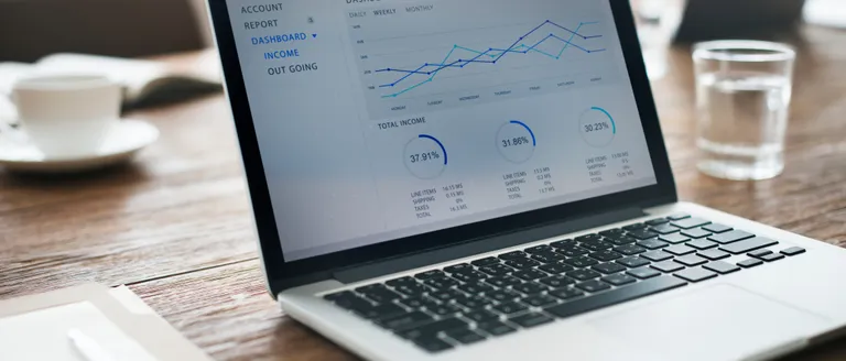 A laptop displaying a search analytics dashboard.